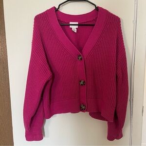Hot pink thick knit sweater.